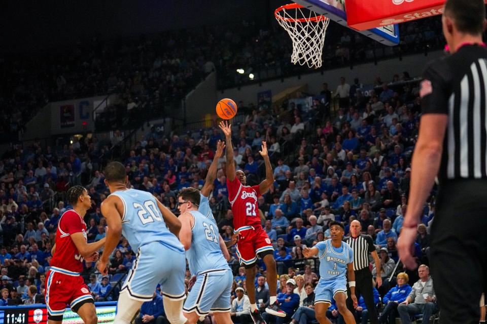 Bradley Braves guard Duke Deen (21) shoots over Indiana State guard Isaiah Swope during BU's 95-86 overtime loss at Hulman Center on Saturday, Jan. 27, 2024.