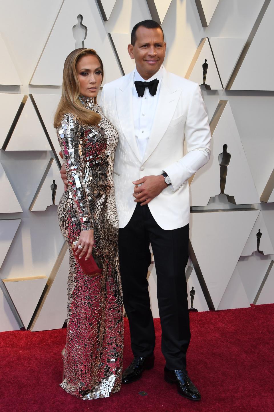 <h1 class="title">Jennifer Lopez and Alex Rodriguez both in Tom Ford</h1><cite class="credit">Photo: Getty Images</cite>