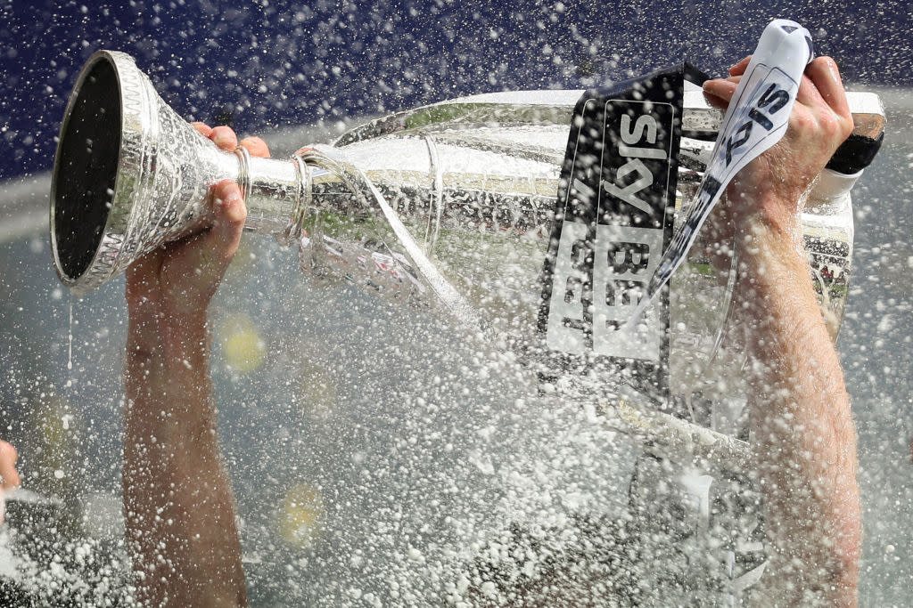  League One season preview 2023/24 LONDON, ENGLAND - MAY 20: Tony Craig of Millwall holds up the trophy during the Sky Bet League One Playoff Final between Bradford City and Millwall at Wembley Stadium on May 20, 2017 in London, England. (Photo by Matthew Ashton - AMA/Getty Images) 