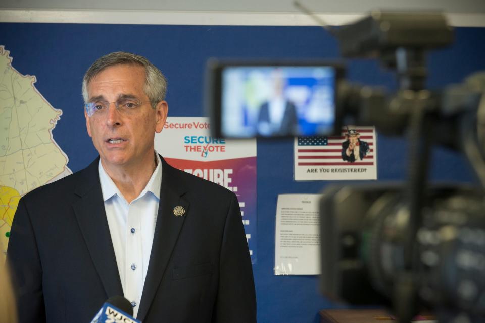 Secretary of State Brad Raffensperger talks to a WJCL reporter at the Effingham County Election and Registration Office on Monday. 