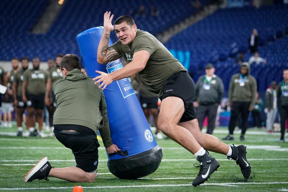 Clemson defensive lineman Bryan Bresee runs a drill at the NFL football scouting combine in Indianapolis, Thursday, March 2, 2023. (AP Photo/Michael Conroy)