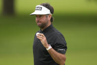Bubba Watson waves after making a putt on the 13th hole during the third round of the PGA Championship golf tournament at Southern Hills Country Club, Saturday, May 21, 2022, in Tulsa, Okla. (AP Photo/Matt York)