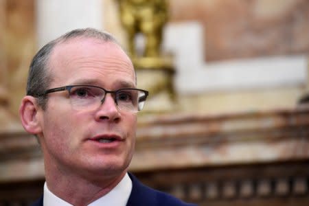 FILE PHOTO: Ireland's Foreign Minister Simon Coveney speaks during a news conference in Dublin, Ireland, April 12, 2018. REUTERS/Clodagh Kilcoyne/File Photo