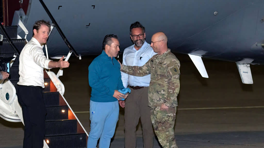  American detained in Venezuela arrives home after prisoner swap. 