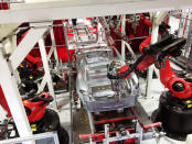 FILE PHOTO -- Tesla vehicles are being assembled by robots at Tesla Motors Inc factory in Fremont, California, U.S. on July 25, 2016. REUTERS/Joseph White/File Photo `