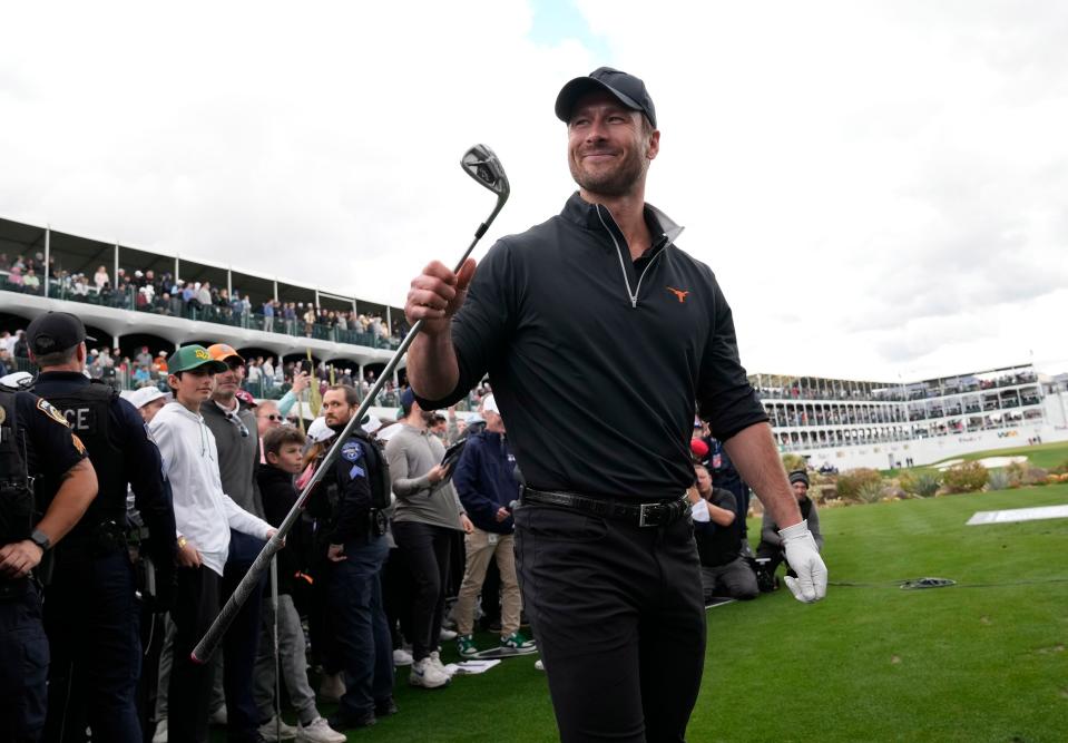 Actor Glen Powell reacts to his shot during the WHOOP Shot at Glory on the 16th hole at TPC Scottsdale on Feb. 7, 2024.