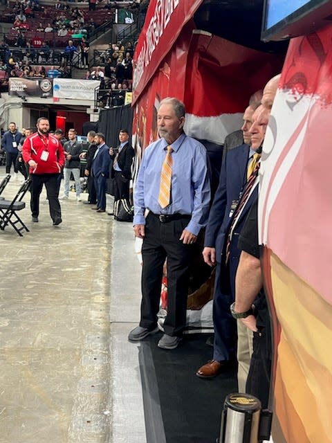 Jim Wegesin waits outside the tunnel in Ohio State’s Schottenstein Center to be introduced in front of 16,000 fans as an enshrinee in the Ohio High School Wrestling Coaches Association Hall of Fame.