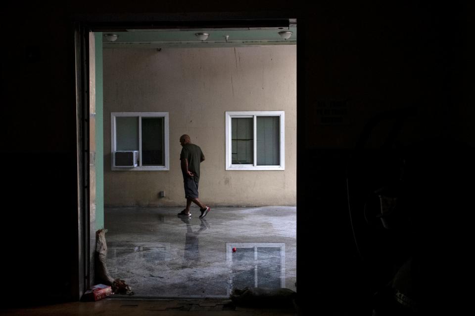 Water collects on the ground inside an unpermitted housing complex that will shut down, displacing hundreds in San Bernardino, Calif., on October 5, 2022. 