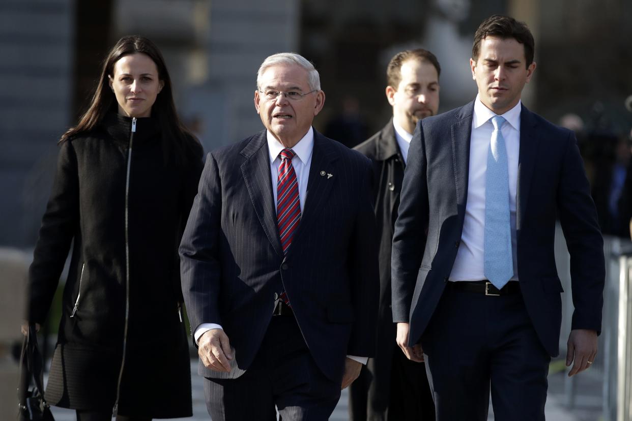 Sen. Bob Menendez, center, walks with his son, Rob, right, and his daughter, Alicia, while leaving Martin Luther King Jr. Federal Courthouse after U.S. District Judge William H. Walls declared a mistrial in Menendez's federal corruption trial, Nov. 16, 2017, in Newark, N.J. Rob, is running for a seat being vacated by retiring Democratic Rep. Albio Sires.