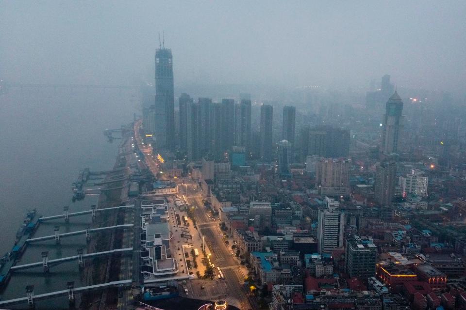 An aerial view shows residential and commercial buildings of Wuhan in China's central Hubei province on January 27, 2020, amid a deadly virus outbreak which began in the city.