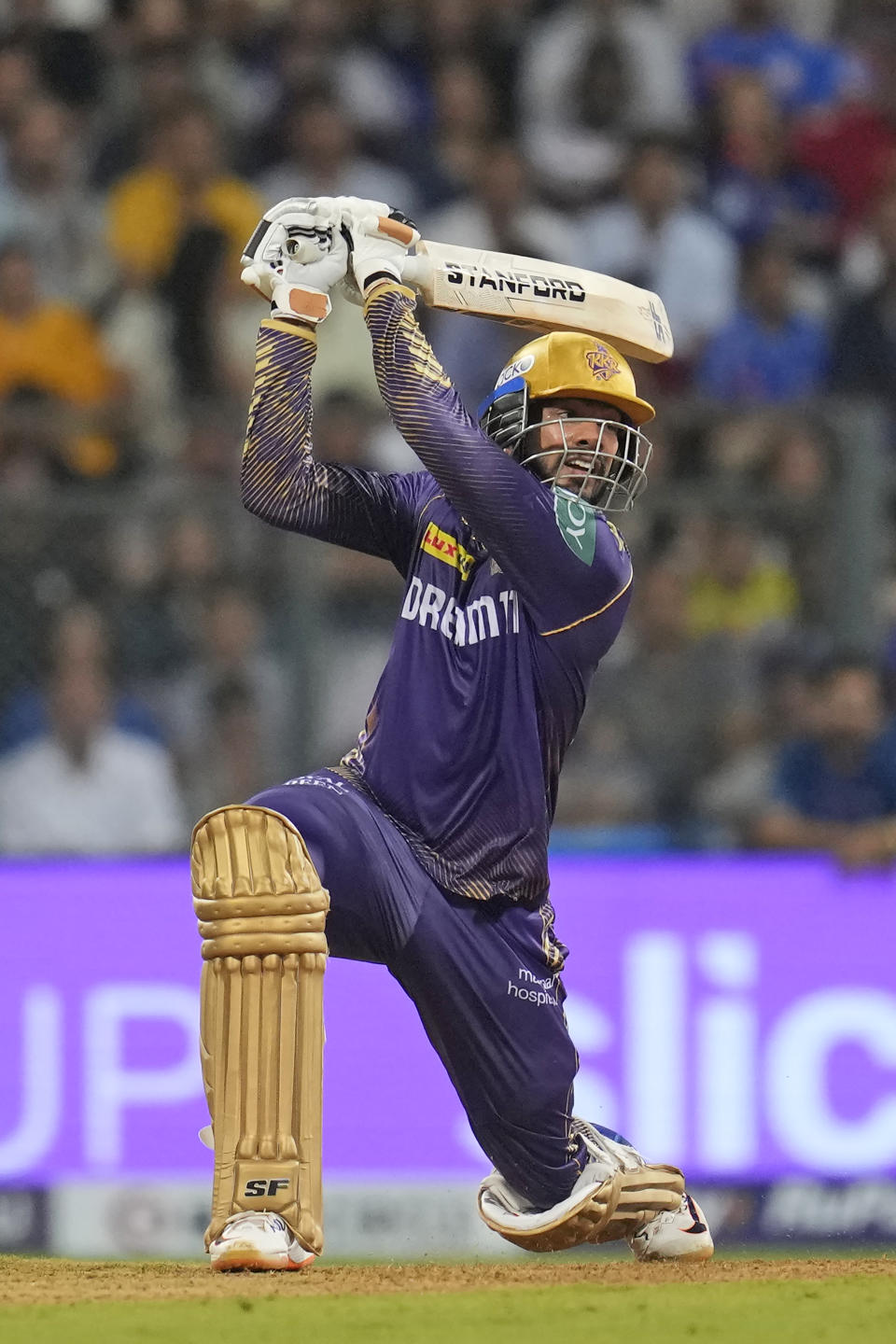 Kolkata Knight Riders' Venkatesh Iyer plays a shot during the Indian Premier League cricket match between Mumbai Indians and Kolkata Knight Riders in Mumbai, India, Friday, May 3, 2024. (AP Photo/Rajanish Kakade)