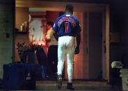 FILE - In this Oct. 7, 2001, file photo, Toronto Blue Jays' Tony Fernandez walks the tunnel to the clubhouse after pinch-hitting n the eighth inning against the Cleveland Indians in a baseball game in Toronto, his last game in the majors. The Blue Jays will honor the late Fernandez by wearing a patch with his No. 1 on the left sleeve of uniform jerseys this season. Fernandez had kidney problems and died Feb. 16, 2020, at age 57. (Fred Thornhill/The Canadian Press via AP, File)
