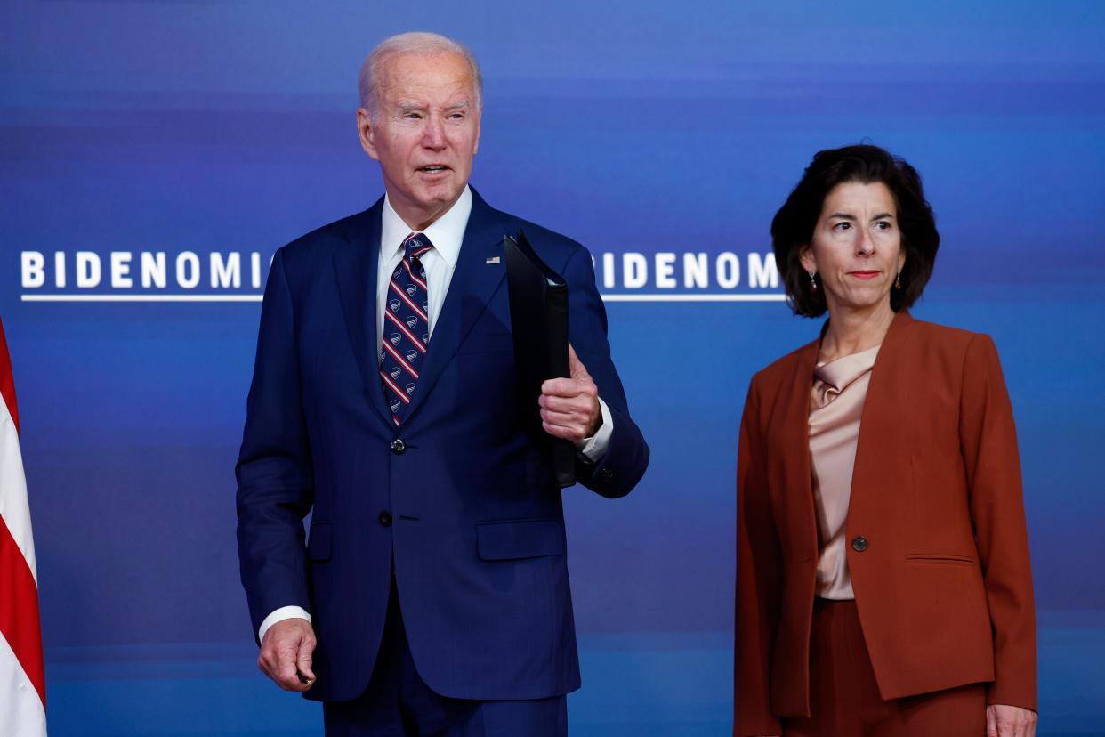 President Joe Biden responds to a question about hostage negotiations with Hamas alongside U.S. Commerce Secretary Gina Raimondo at an event in the South Court Auditorium in the Eisenhower Executive Office Building at the White House on October 23, 2023.