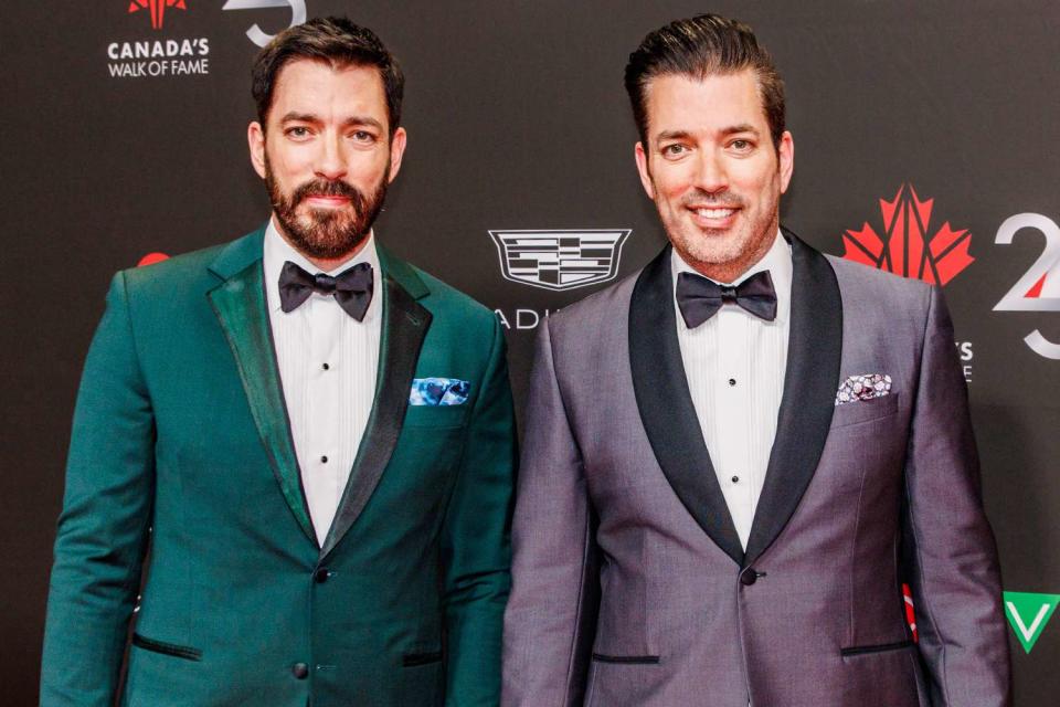 <p>Mathew Tsang/WireImage</p> Drew Scott (left) and Jonathan Scott