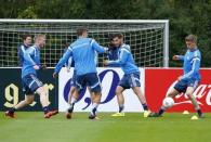 Germany national soccer players Andre Schuerrle, Max Kruse, Kevin Volland and Matthias Ginter (L-R) take part in a training session in Frankfurt, Germany, October 6, 2015. REUTERS/Ralph Orlowski