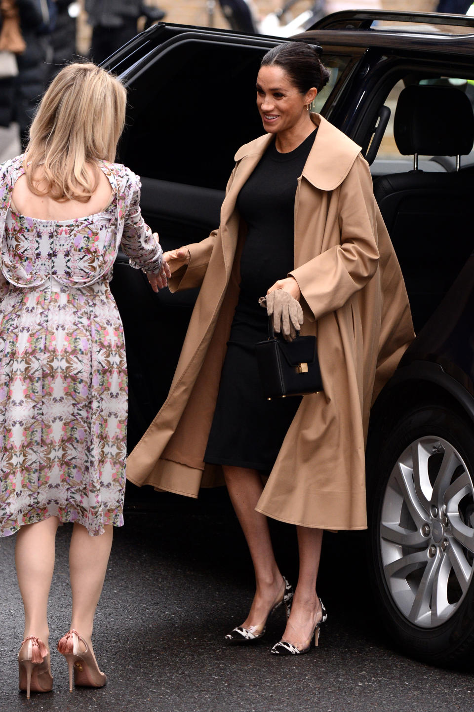 The Duchess of Sussex wore a chic ensemble to kick-start 2019, as she paid a visit to one of her first patronages Smart Works. The pregnant royal chose a £2,492 camel-hued Oscar de la Renta coat with a £170 black dress by US maternity label Hatch. [Photo: Getty]