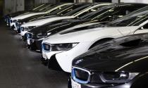 Eight new BMW i8 plug-in hybrid sports cars are parked before the official delivery in Munich in this June 5, 2014 file picture. In recent weeks, the economy that proud German politicians have taken to describing as a "growth locomotive" and "stability anchor" for Europe, has been hit by a barrage of bad news that has surprised even the most ardent Germany sceptics. The big shocker came on August 14, 2014, when the Federal Statistics Office revealed that gross domestic product (GDP) had contracted by 0.2 percent in the second quarter. Picture taken June 5, 2014. TO MATCH STORY GERMANY-ECONOMY/ REUTERS/Michaela Rehle/Files (GERMANY - Tags: BUSINESS TRANSPORT)