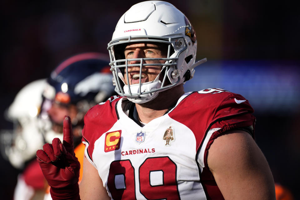 Arizona Cardinals defensive end J.J. Watt (99) motions after a sack against the Denver Broncos during the first half of an NFL football game, Sunday, Dec. 18, 2022, in Denver. (AP Photo/David Zalubowski)