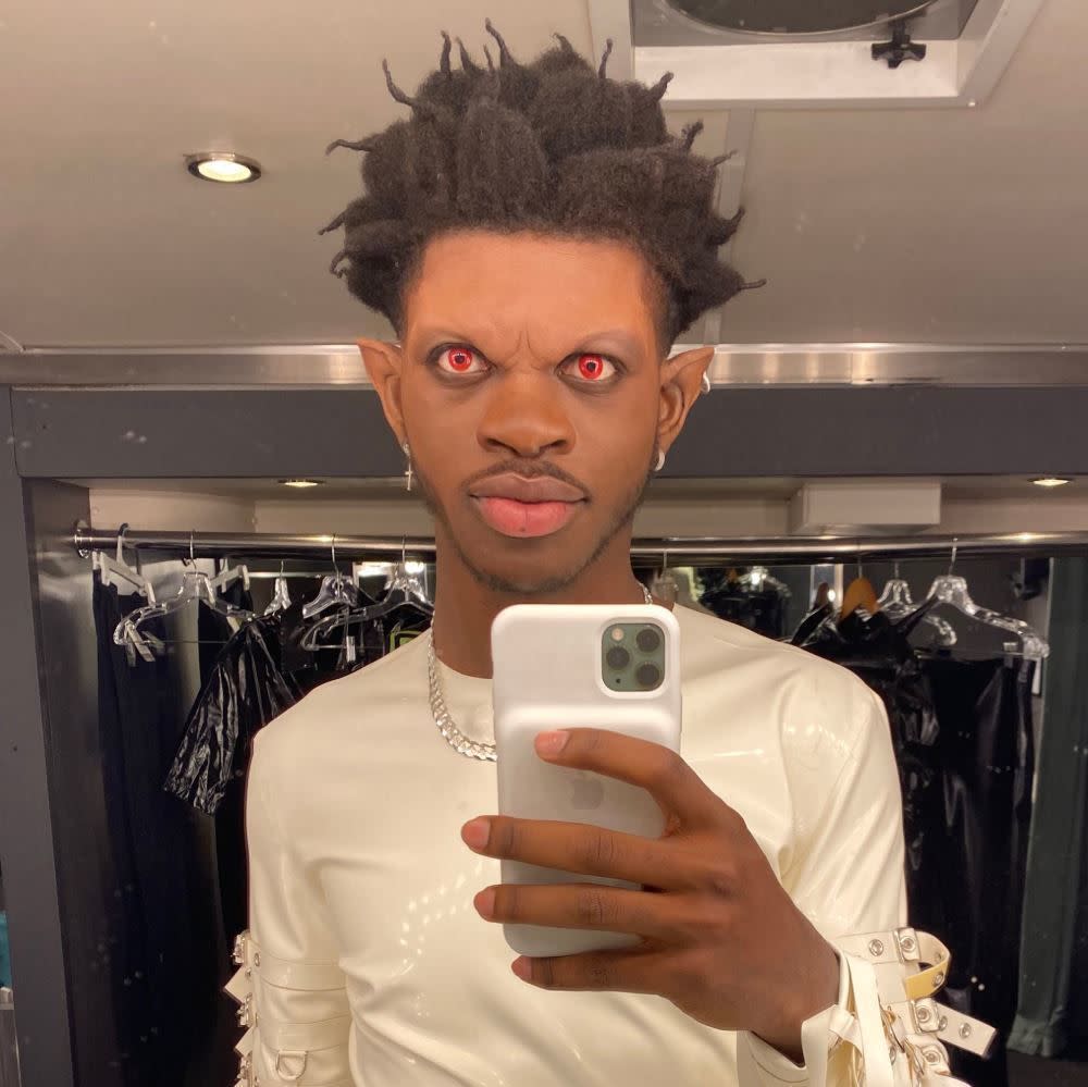 Lil Nas X, is that you? The “Panini” rapper, fresh of his two Grammy wins, is already back to making new music, shooting the video for his new song “Rodeo” in a fully terrifying vampire look on Feb. 4, 2020. “RODEO MUSIC VIDEO THIS WEEK! [vampire emoji],” Lil Nas X captioned this selfie on set.