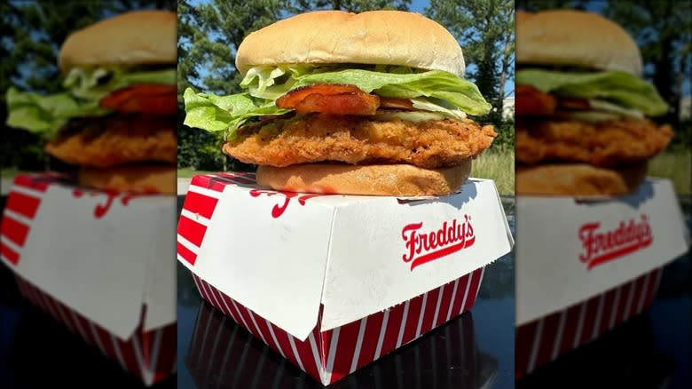 Chicken sandwich on top of freddy's box