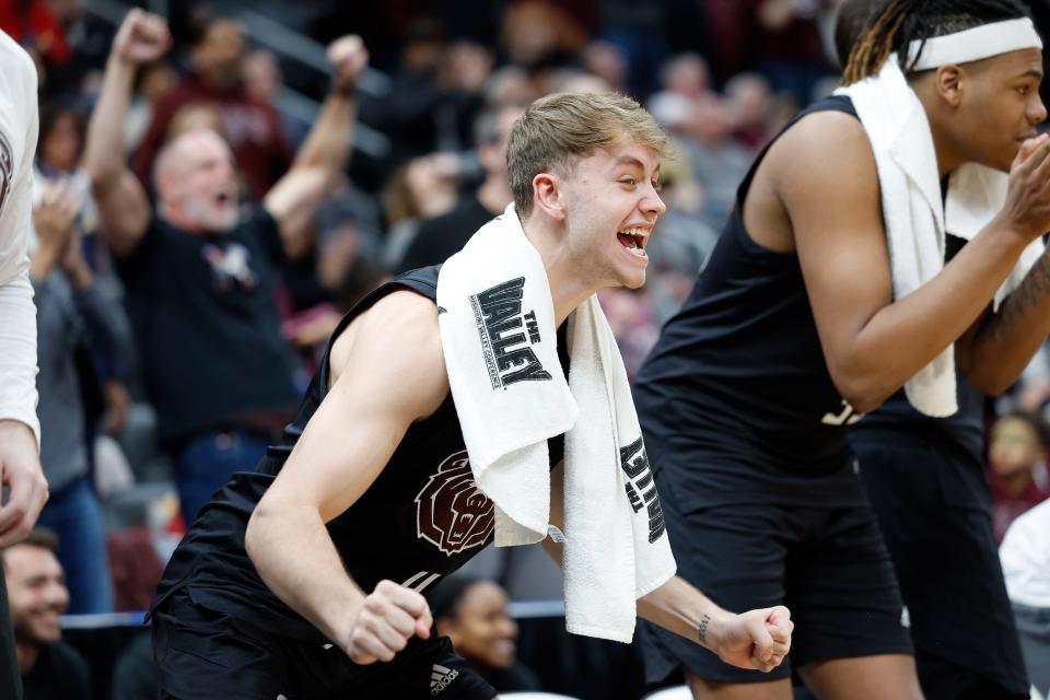 Missouri State's Kanon Gipson (4) celebrates on the bench during a Missouri Valley Conference Tournament game against Southern Illinois, Friday, March 3, 2023, at Enterprise Center in St. Louis. 