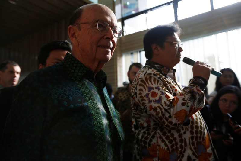 U.S. Commerce Secretary Wilbur Ross reacts as Indonesia's Chief Economic Minister Airlangga Hartarto talks to journalists during a press briefing after their meeting in Jakarta