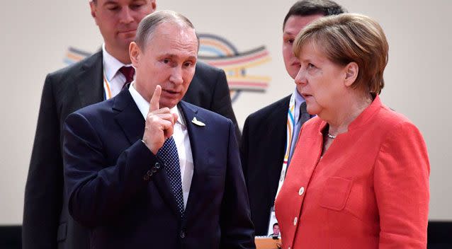German chancellor Angela Merkel appeared to roll her eyes at Vladmir Putin. Photo: AAP