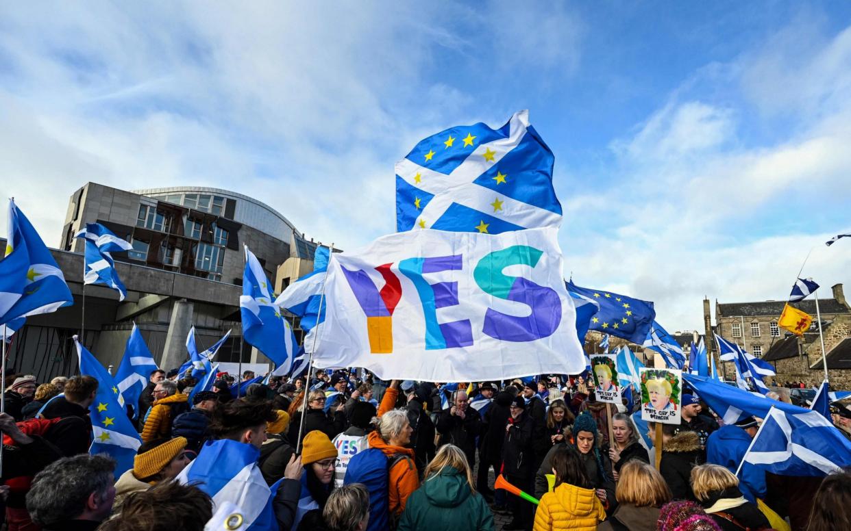 Separatists attending a demonstration outside the Scottish Parliament in February this year - AFP