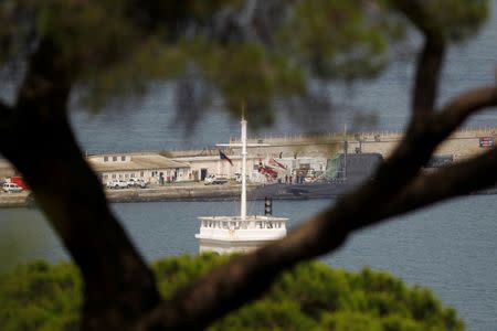 A British nuclear Astute-class submarine HMS Ambush is seen docked in a port while it is repaired after it was involved in a "glancing collision" with a merchant vessel off the coast of the peninsula of Gibraltar on Wednesday, in the British overseas territory of Gibraltar, July 21, 2016. REUTERS/Jon Nazca