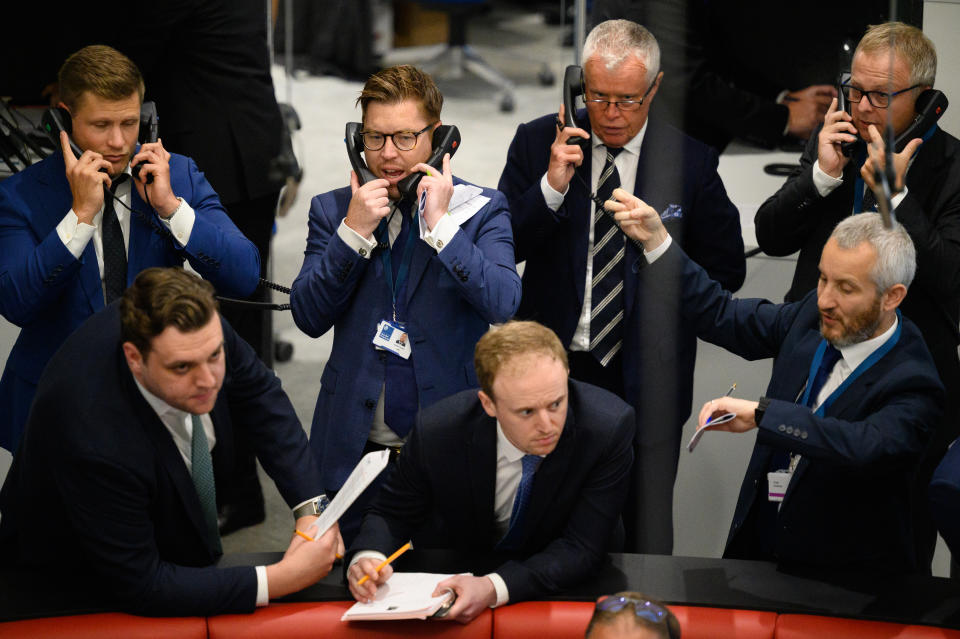 LONDON, ENGLAND - SEPTEMBER 06: Traders, brokers and clerks shout and gesture on the first day of in-person trading at the London Metal Exchange (LME) on September 06, 2021 in London, England. The trading ring, which has been operating since 1877, is the last 