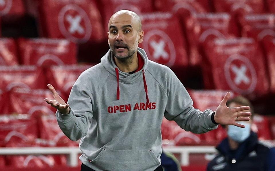 Pep Guardiola wears Open Arms hoodie - NMC POOL