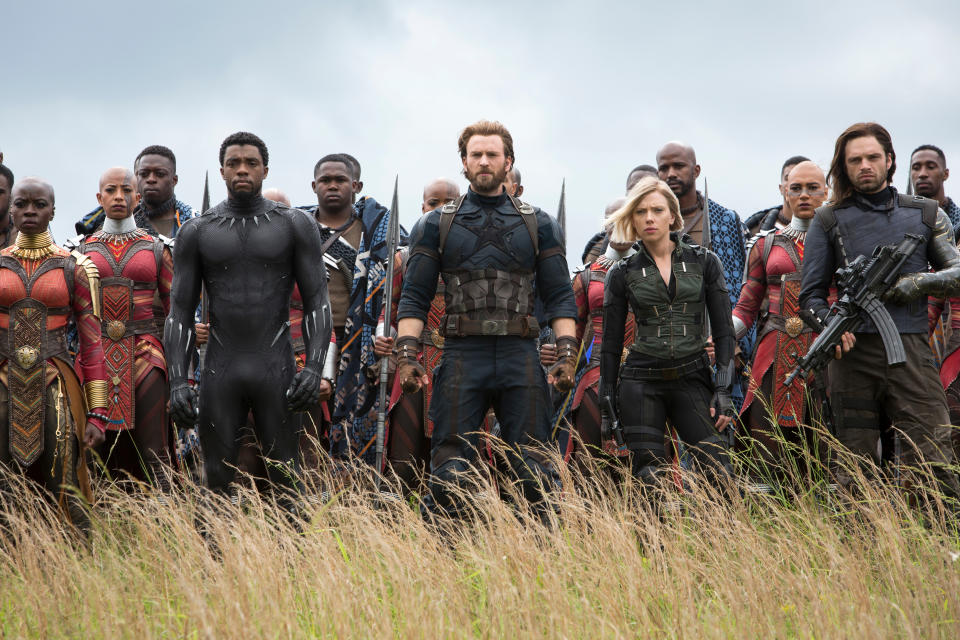 This image released by Marvel Studios shows, front row from left, Danai Gurira, Chadwick Boseman, Chris Evans, Scarlet Johansson and Sebastian Stan in a scene from “Avengers: Infinity War.” (Chuck Zlotnick/Marvel Studios via AP)