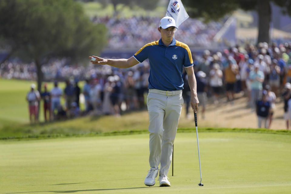 Europe's Matt Fitzpatrick acknowledges the crowd on the 2nd green during his singles match at the Ryder Cup golf tournament at the Marco Simone Golf Club in Guidonia Montecelio, Italy, Sunday, Oct. 1, 2023. (AP Photo/Andrew Medichini)