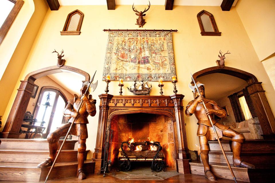 The fireplace in The Grand Hall at Highlands Castle.