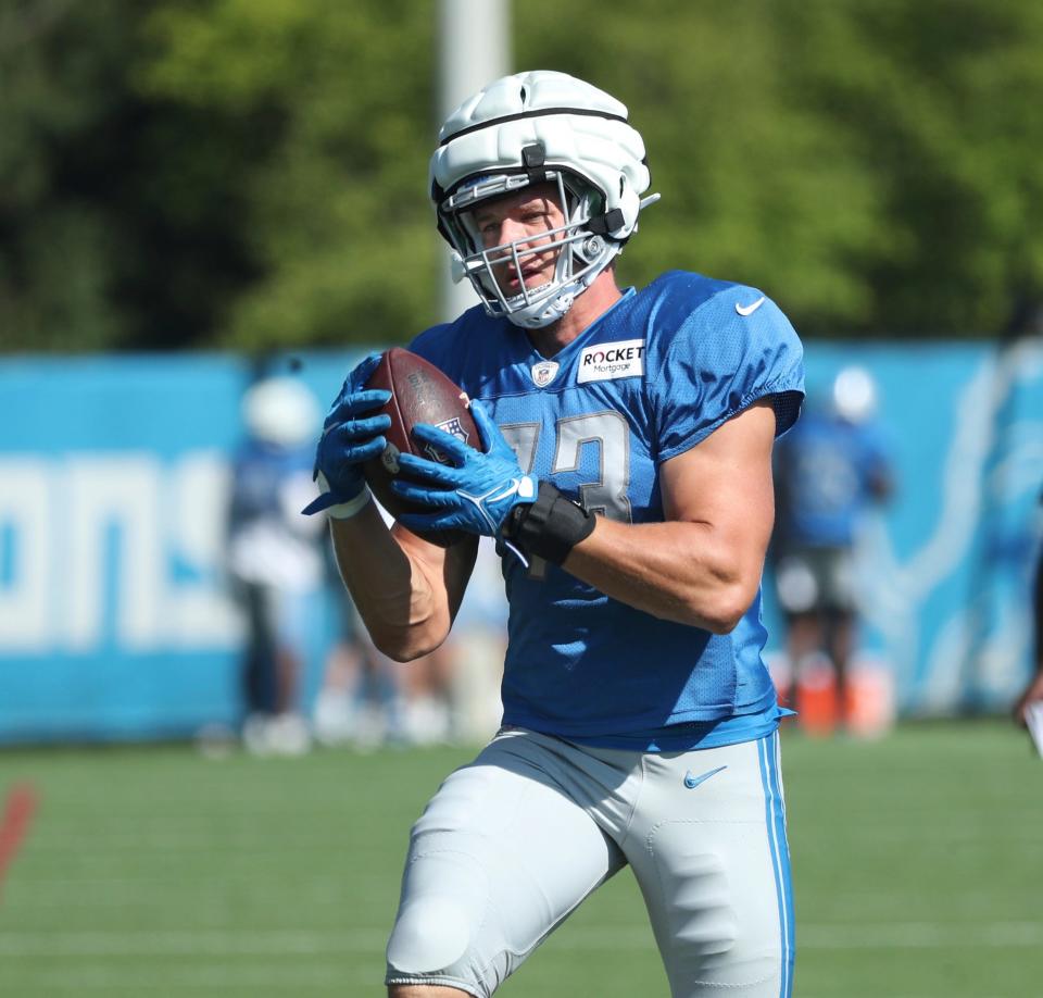 Lions tight end Daniel Helm makes a catch during the Lions' joint practice with the Jaguars on Wednesday, Aug. 16, 2023, in Allen Park.