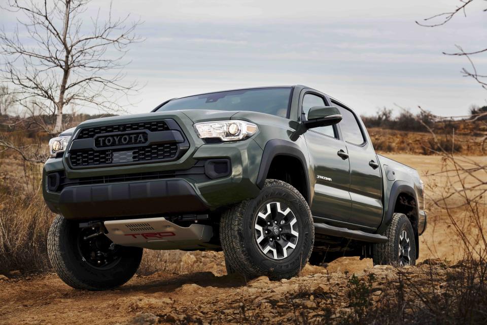This photo provided by Toyota shows the 2023 Tacoma TRD Off Road. It's Edmunds' pick for a reasonably priced midsize truck with solid off-road trail capability. (Courtesy of Toyota Motor Sales U.S.A. via AP