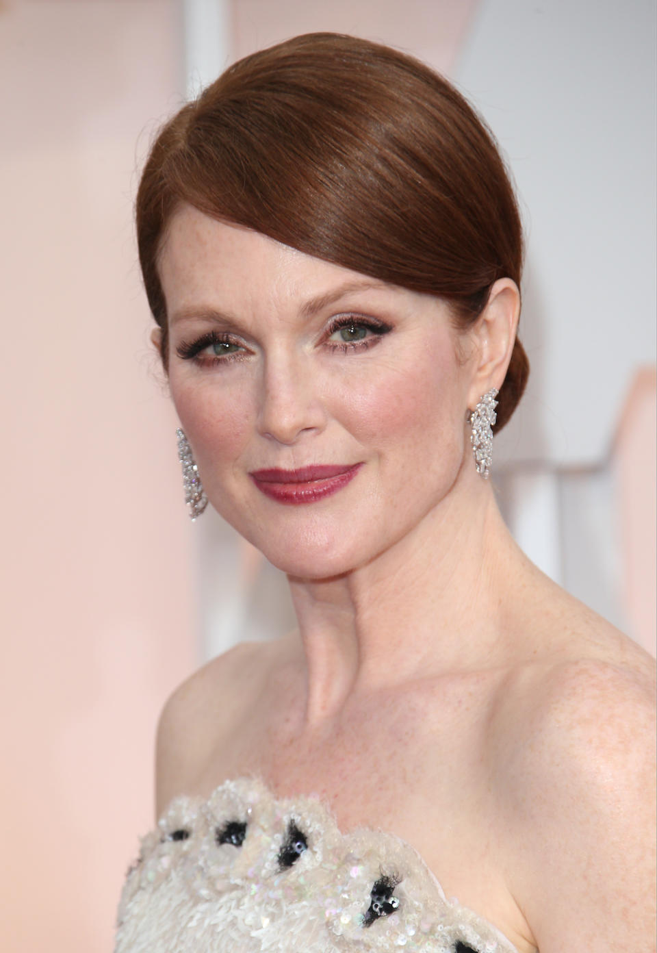 Julianne Moore's heavy side part updo