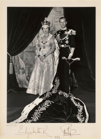 <p>Royal Collection Trust/His Majesty King Charles III 2024</p> The Queen Mother's copy of Queen Elizabeth and Prince Philip's coronation photo from 1953.