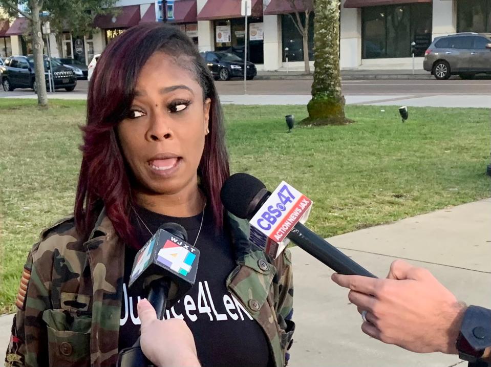 Natassia Woods speaks to reporters at a Jacksonville Community Action Committee rally outside the Duval County Courthouse. Protesters cited the injuries suffered by her son Le'Keian Woods when the Jacksonville Sheriff's Office arrested him as an example of police using excessive force without being held accountable.