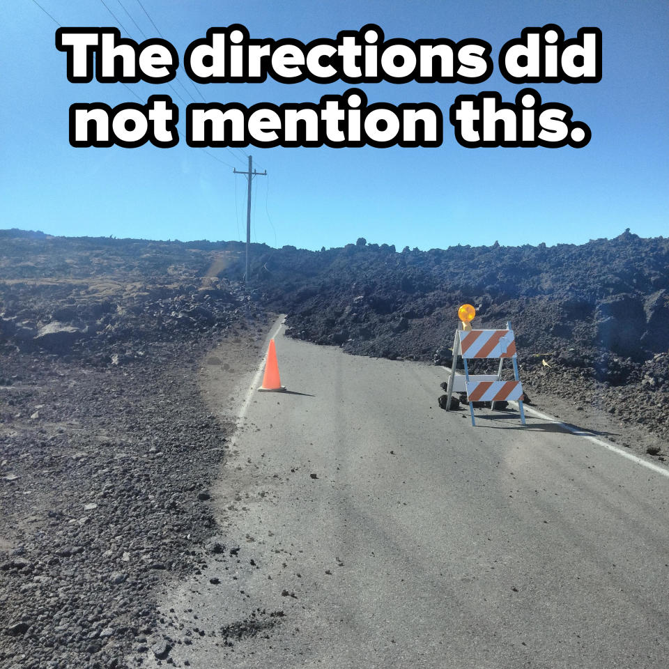 A road completely blocked by excavated dirt, with caption, "The directions did not mention this"
