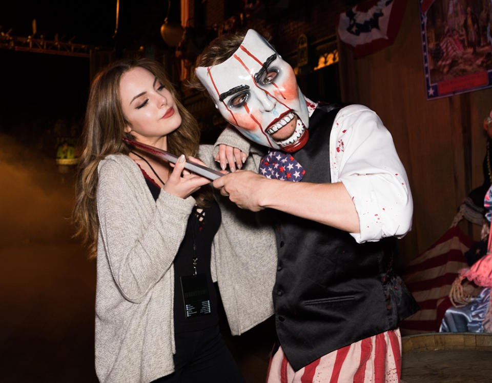 <p><i>Sex&Drugs&Rock&Roll</i> star Liz Gillies also looked cool as a cucumber while being held at knifepoint. Clearly, Universal Studios needs to work on making the Purge scare zone scarier! (Photo: Mike Danenberg/Universal Studios Hollywood) </p>