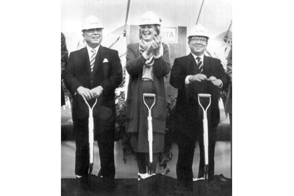 FILE - Kentucky Governor Martha Layne Collins, center, breaks into a large smile as does Toyota Motor Corporation Chairman of the Board Eiji Toyoda, left, and then President Shoichiro Toyoda just after the three turned over the soil for the official groundbreaking ceremony Monday, May 5, 1986, near Georgetown, KY. Toyoda, who as a son of the company's founder oversaw Toyota's expansion into international markets has died. He was 97. (AP Photo/Tom Moran, File)