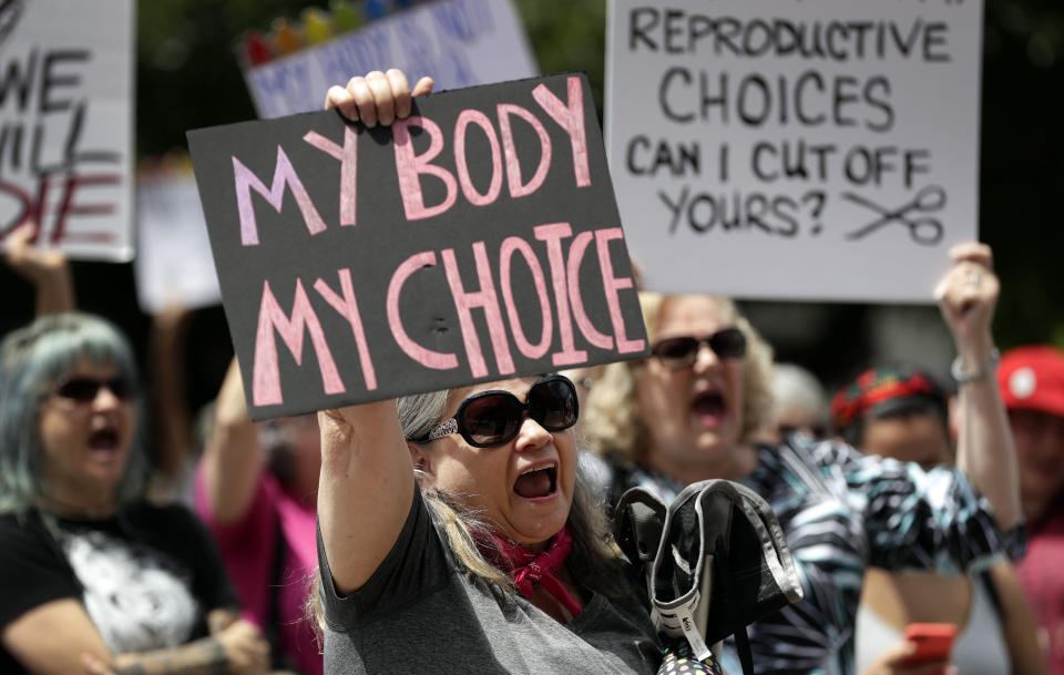 FILE - A group gathers to protest abortion restrictions at the State Capitol in Austin, Texas, Tuesday, May 21, 2019. Abortion rights advocates say the pandemic has demonstrated the value of medical care provided virtually, including the privacy and convenience of abortion taking place in a woman’s home, instead of a clinic.(AP Photo/Eric Gay, File)