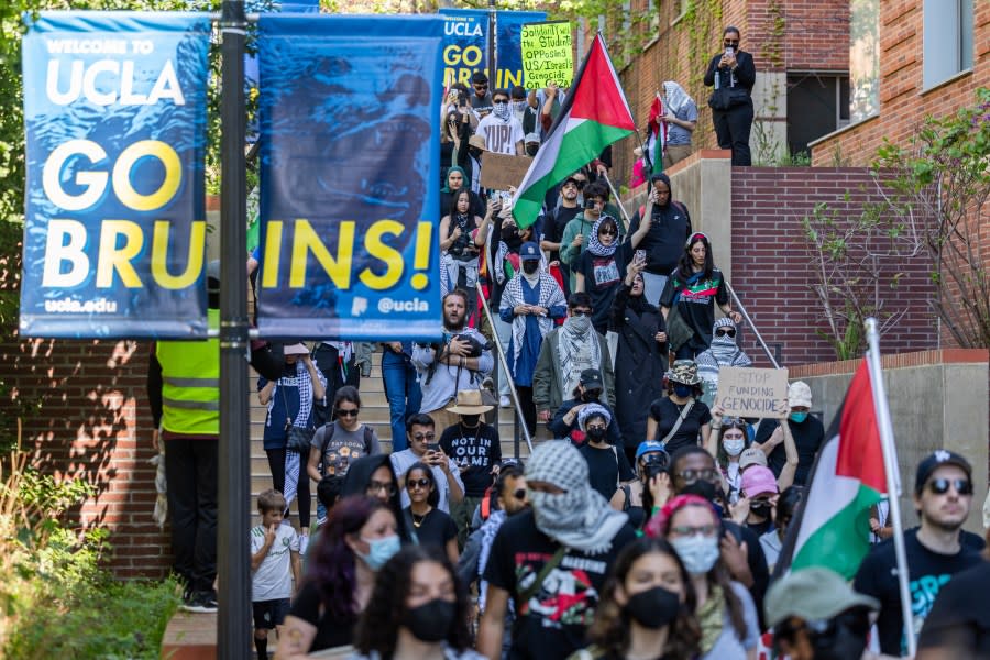 LOS ANGELES, CA – APRIL 28: Pro-Palestinian students and activists holding Palestinian flags and placards participate in a demonstration at the University of California Los Angeles (UCLA) on April 28, 2024 in Los Angeles, California. Protests against Israel’s military actions in Gaza have intensified across multiple American universities for over a week, calling for a permanent ceasefire in the Gaza Strip as well as the cessation of U.S. military aid to Israel. (Photo by Qian Weizhong/VCG via Getty Images)