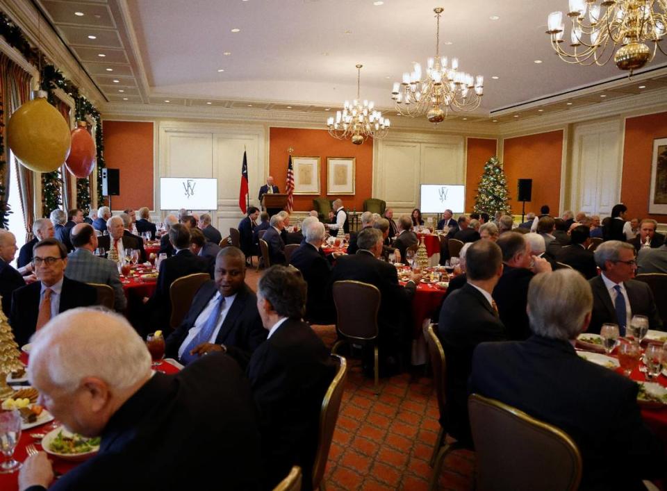 Emcee George Young speaks during the Exchange Club’s charity luncheon at the Fort Worth Club on Wednesday.