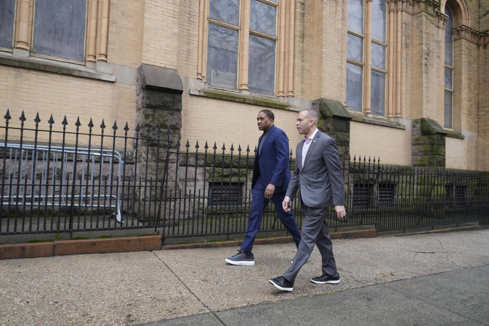 House Minority Leader Hakeem Jeffries, D-N.Y., right, talks with Rev, Lawrence E. Aker, III, as they walk around Cornerstone Baptist Church in New York, Thursday, Jan. 25, 2024. For Jeffries, 53, his leadership in the House traces back to his formative days growing up and serving at Cornerstone, a historically Black congregation which he still attends. “It certainly was an important part of my mother’s life, and therefore my younger brother’s and myself,” he said during an interview. (AP Photo/Seth Wenig)