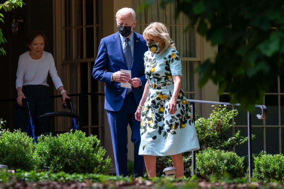 Former first lady Rosalynn Carter looks on as President Joe Biden and first lady Jill Biden leave the home of former President Jimmy Carter during a trip to mark Biden's 100th day in office, Thursday, April 29, 2021, in Plains, Ga. (AP Photo/Evan Vucci)