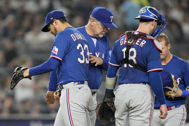 Texas Rangers' Mitch Garver runs to first after hitting an RBI single  against the New York Yankees during the eighth inning of a baseball game  Friday, June 23, 2023, in New York. (