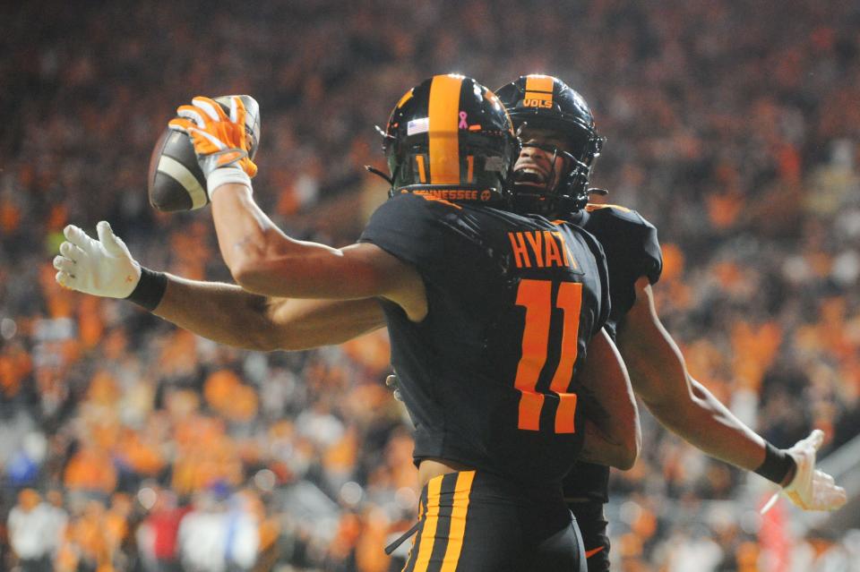 Tennessee wide receiver Jalin Hyatt (11) celebrates the touchdown catch with teammate Tennessee wide receiver Bru McCoy (15) during the NCAA football match between Tennessee and Kentucky in Knoxville, Tenn. on Saturday, Oct. 29, 2022.
