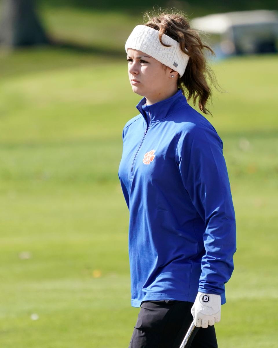 Lenawee Christian's Morgan Bell walks on the course during the 2019 state championship meet.